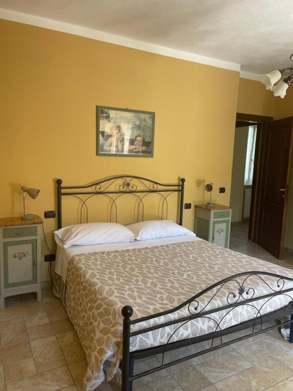 Postel nebo postele na pokoji v ubytování Agriturismo Cascina Anrì