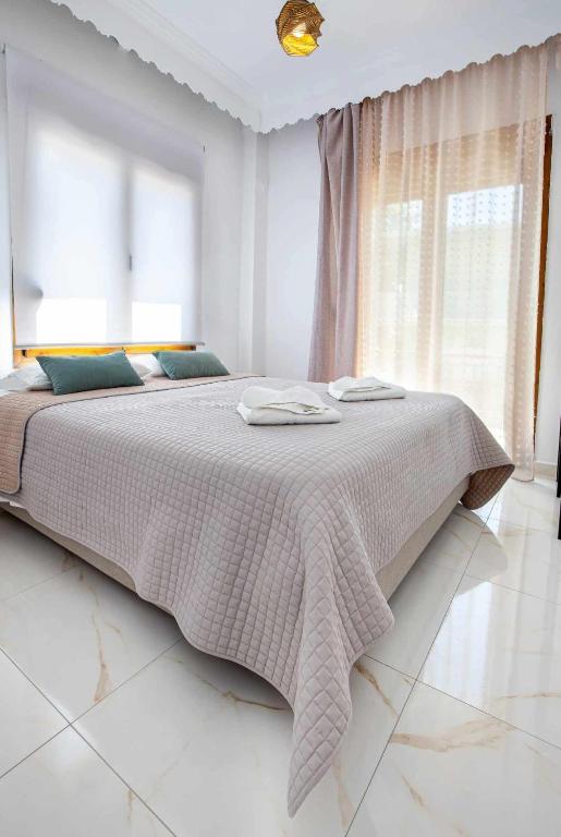 Postel nebo postele na pokoji v ubytování MaK Apartments