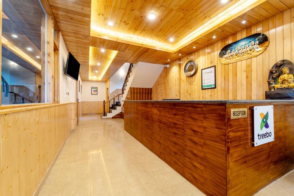TV a/nebo společenská místnost v ubytování Treebo Premium The Takey's