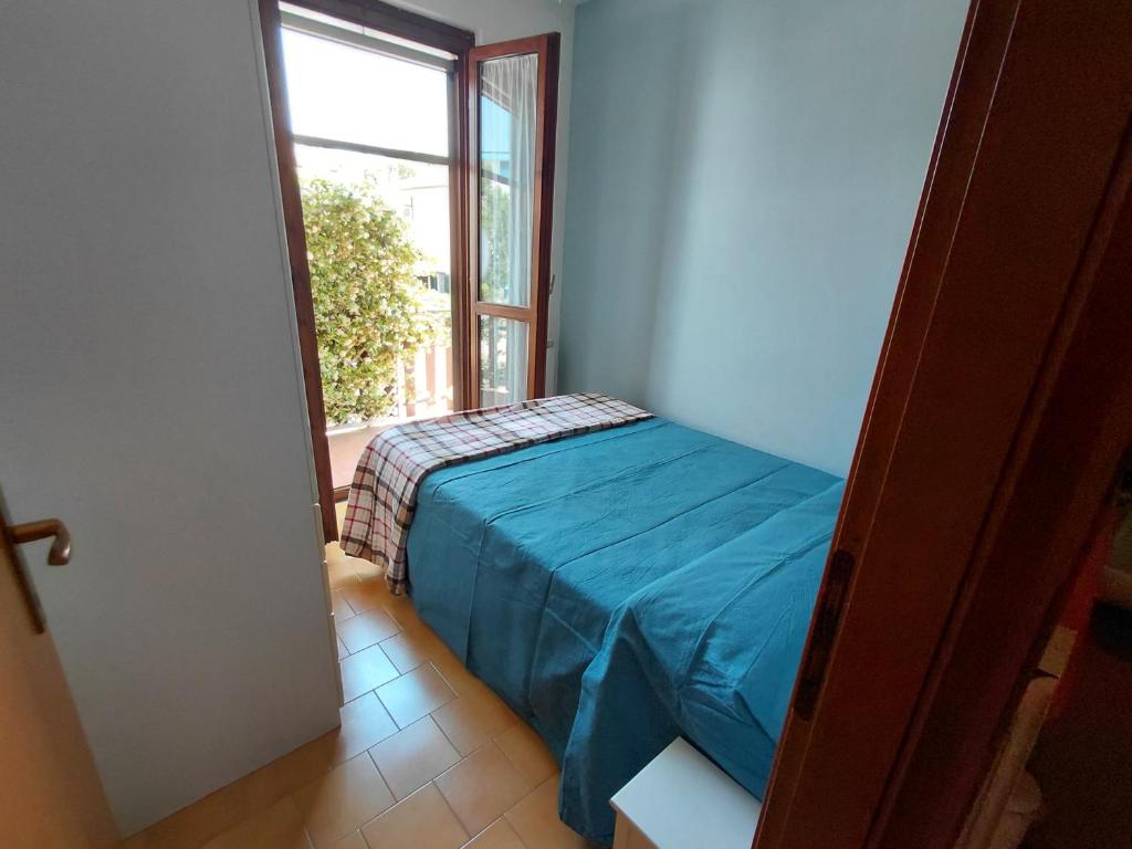 Postel nebo postele na pokoji v ubytování Mari's Home