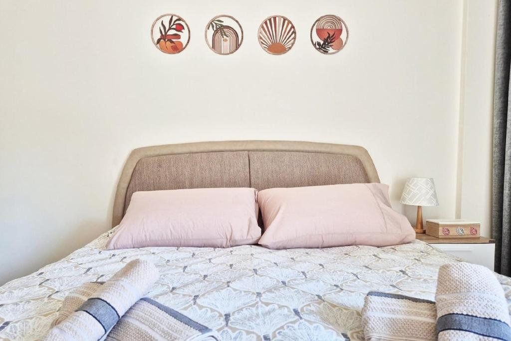 En eller flere senge i et værelse på City Vibes 24-7 Elec BoHome