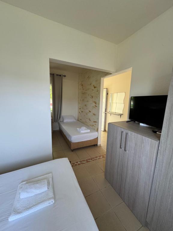 Postel nebo postele na pokoji v ubytování Dafnes Rooms
