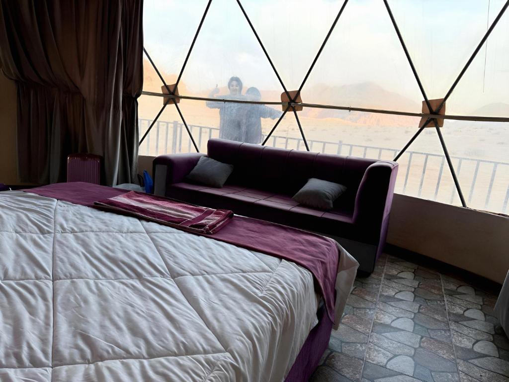Postel nebo postele na pokoji v ubytování Wadi rum caeser camp