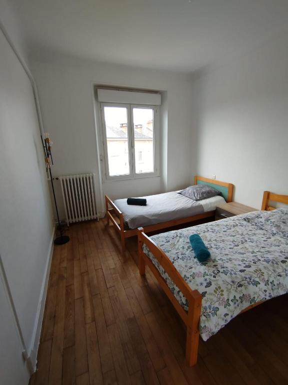 Posteľ alebo postele v izbe v ubytovaní Appartement T4 Cité Cardaillac, Parking Privé, Wifi