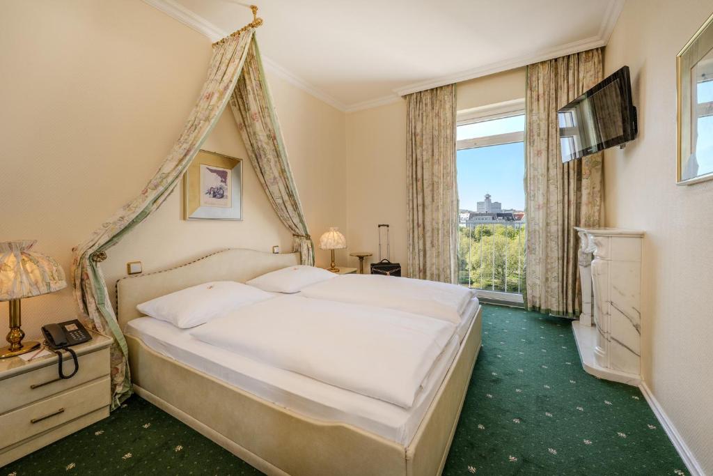Postel nebo postele na pokoji v ubytování Ringhotel Seehof