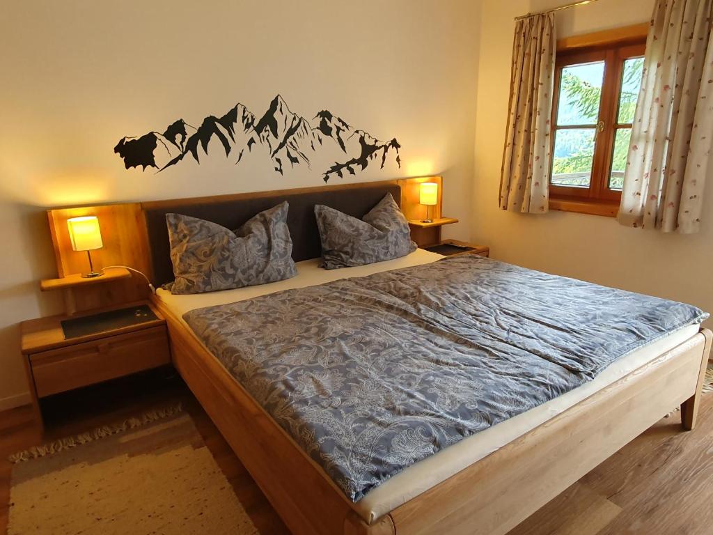 Postel nebo postele na pokoji v ubytování Haus Schraml