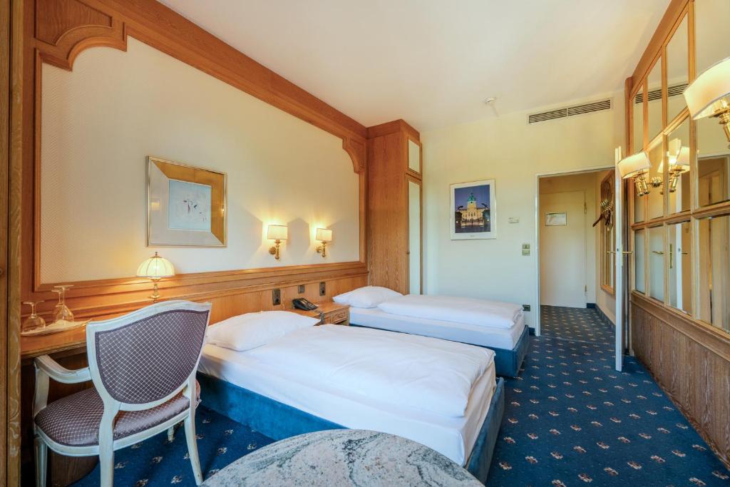 Postel nebo postele na pokoji v ubytování Ringhotel Seehof