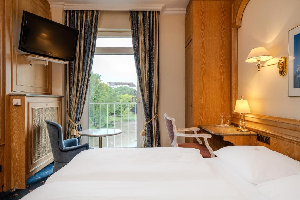 Postel nebo postele na pokoji v ubytování Ringhotel Seehof