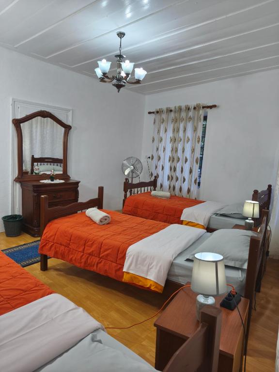 Postel nebo postele na pokoji v ubytování oneTwoSleep GuestHouse