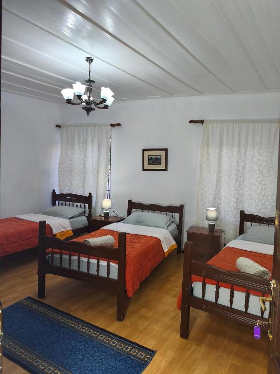Postel nebo postele na pokoji v ubytování oneTwoSleep GuestHouse