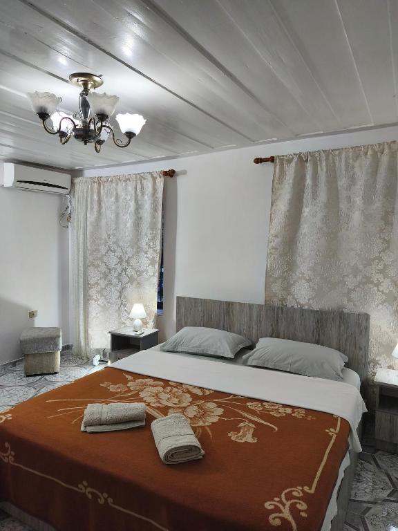 Postel nebo postele na pokoji v ubytování oneTwoSleep GuestHouse