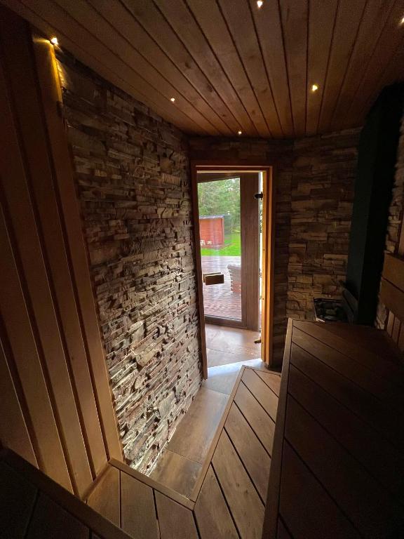 Fotografie z fotogalerie ubytování Roheluse metsamaja with hot tub and sauna v destinaci Kõrve Üks