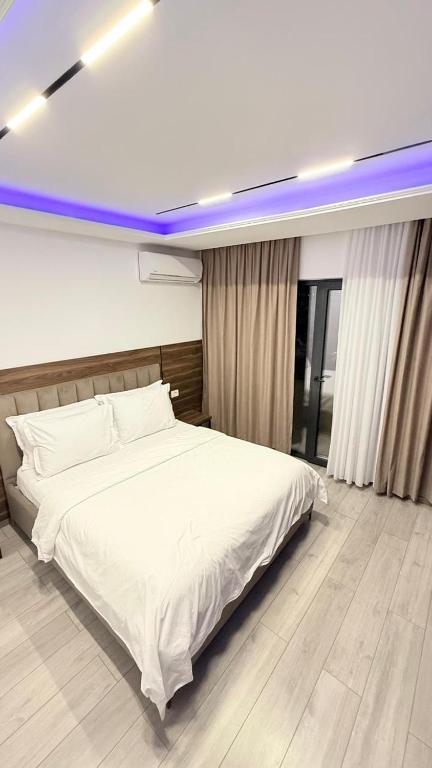 Postel nebo postele na pokoji v ubytování Hotel Agron