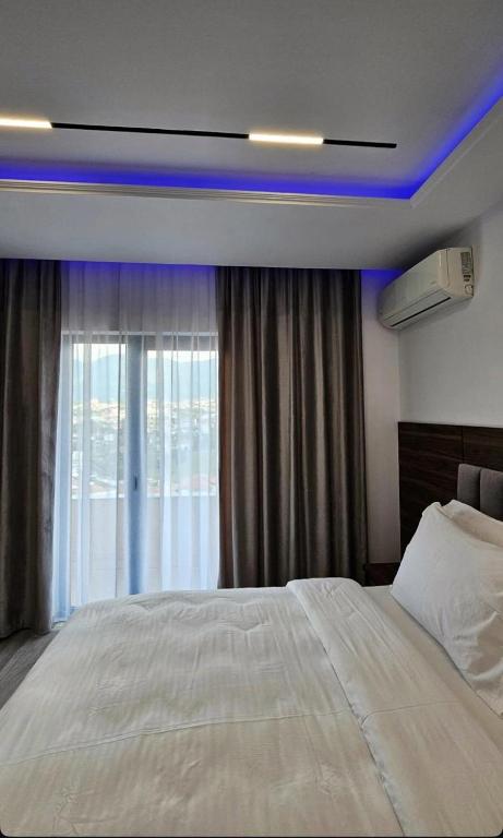 Postel nebo postele na pokoji v ubytování Hotel Agron
