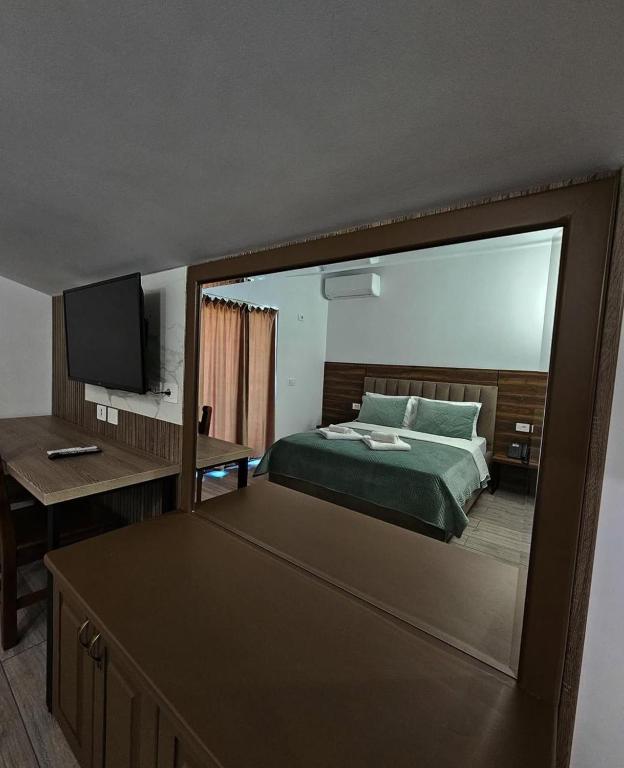 Postel nebo postele na pokoji v ubytování Hotel Agron
