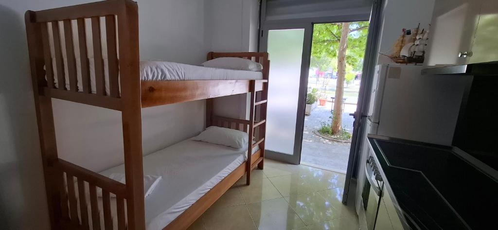 Postel nebo postele na pokoji v ubytování TreRacat Apartment
