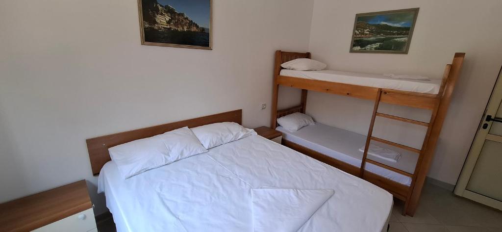 Postel nebo postele na pokoji v ubytování TreRacat Apartment