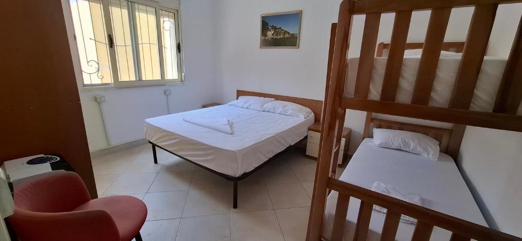 Postel nebo postele na pokoji v ubytování TreRacat Apartment