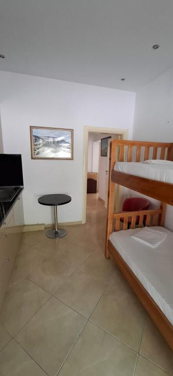 Postel nebo postele na pokoji v ubytování TreRacat Apartment