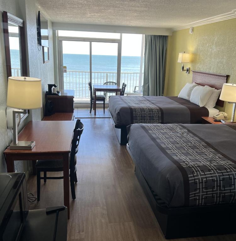Postel nebo postele na pokoji v ubytování Seahawk Motel