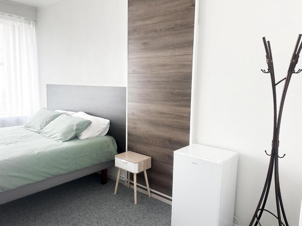 Postel nebo postele na pokoji v ubytování Kerese Beach House