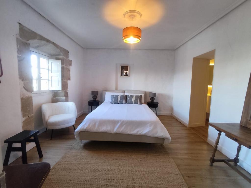 En eller flere senge i et værelse på Villa Vista Ajo