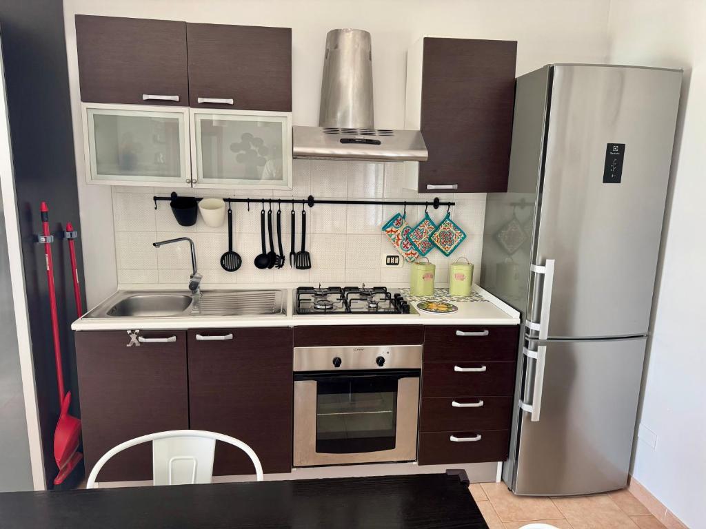 A kitchen or kitchenette at La Corte di Nunu'