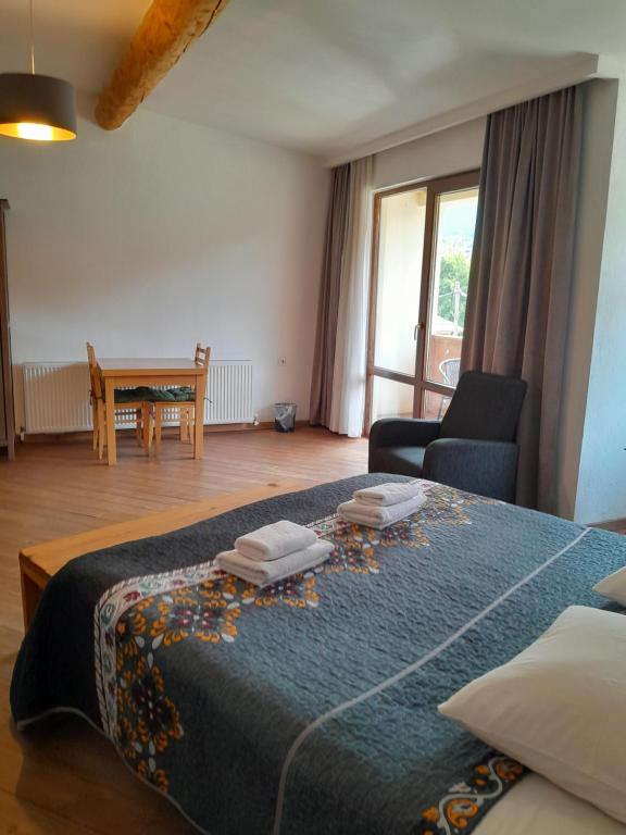 Postel nebo postele na pokoji v ubytování Bapsha Guesthouse