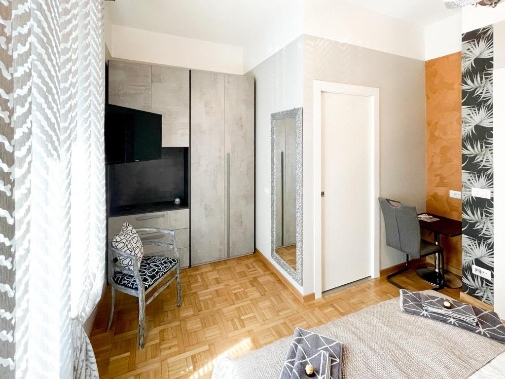 TV a/nebo společenská místnost v ubytování B&B LE CHEVALIER