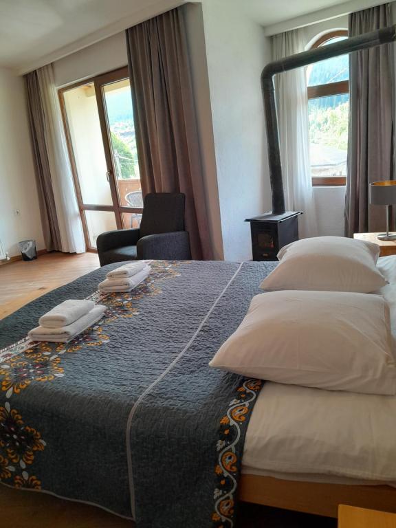 Postel nebo postele na pokoji v ubytování Bapsha Guesthouse