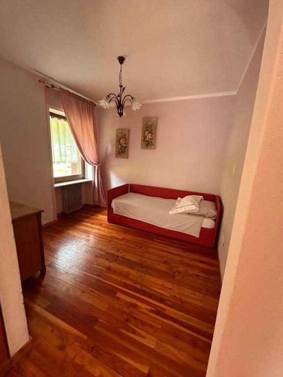 Łóżko lub łóżka w pokoju w obiekcie Agritur Broch