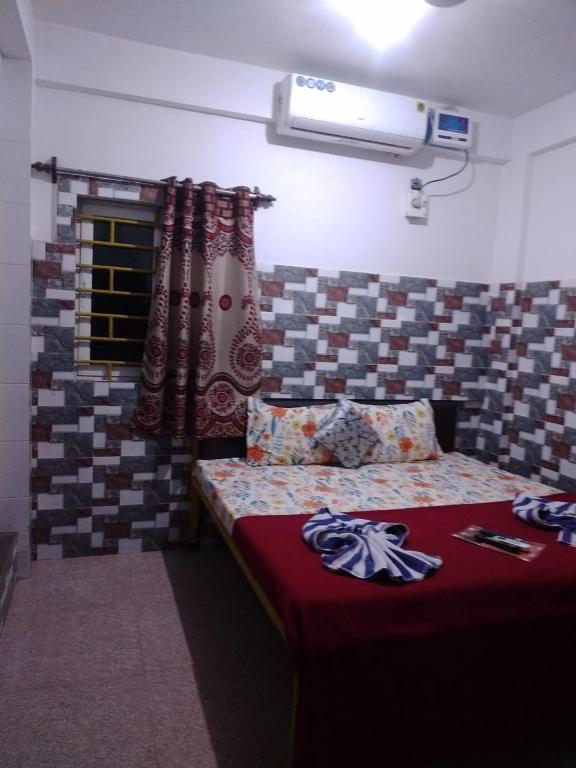 Postel nebo postele na pokoji v ubytování Baga F Leisure Stay Guest House