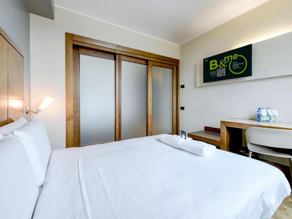 Postel nebo postele na pokoji v ubytování B&B HOTEL Padova