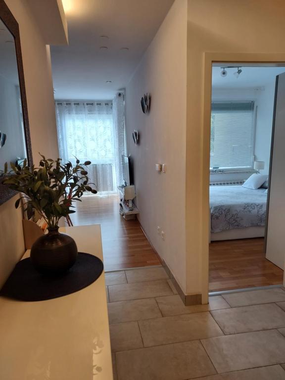 Posteľ alebo postele v izbe v ubytovaní Apartment West