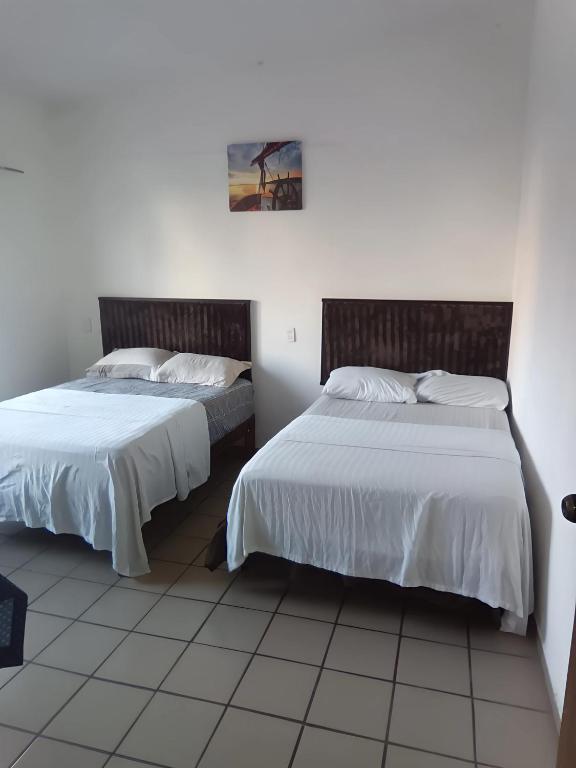 Postel nebo postele na pokoji v ubytování Centrico, seguro, buen precio, Timon