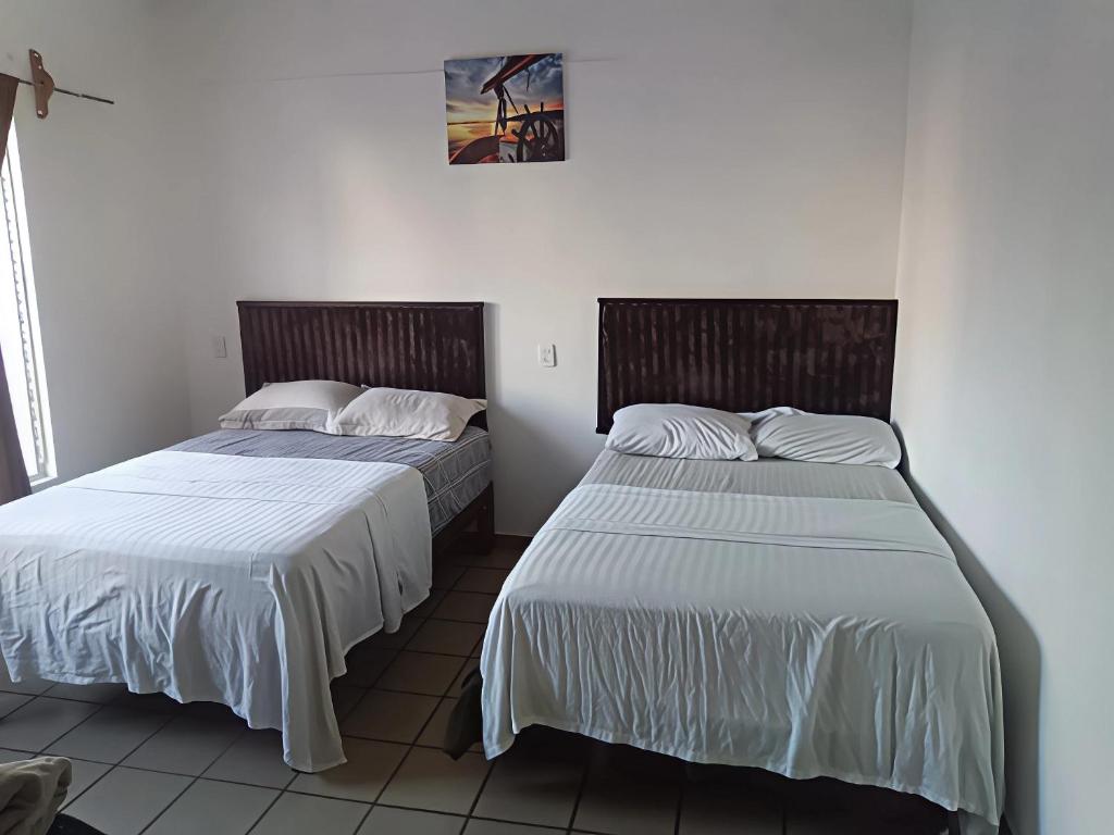 Postel nebo postele na pokoji v ubytování Centrico, seguro, buen precio, Timon