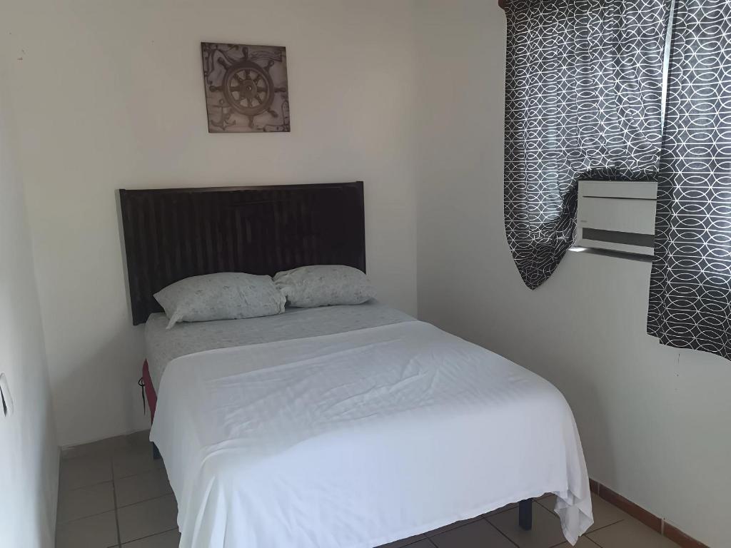 Postel nebo postele na pokoji v ubytování Centrico, seguro, buen precio, Timon