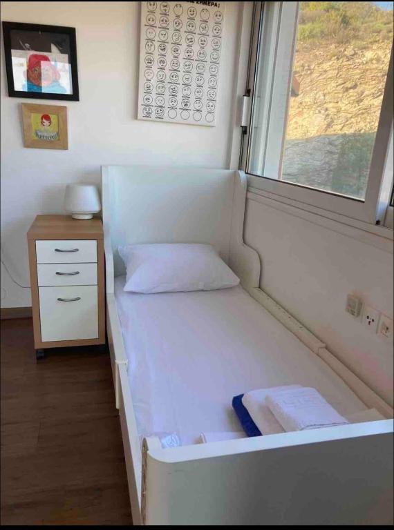 Postel nebo postele na pokoji v ubytování Fodele Delta