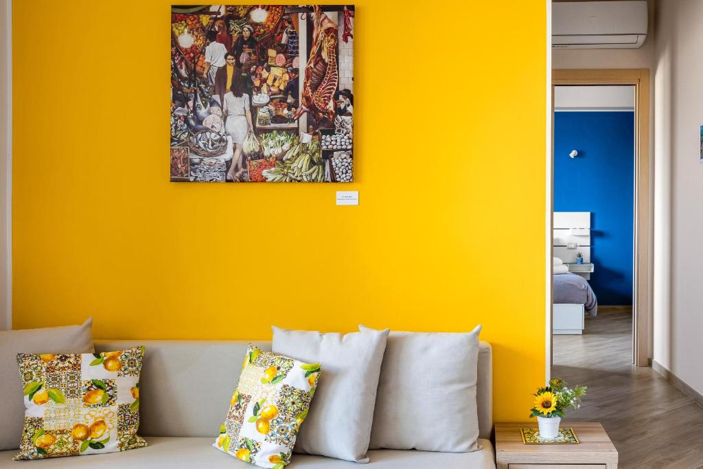 A seating area at ARTrinacria Apartments - Qubba