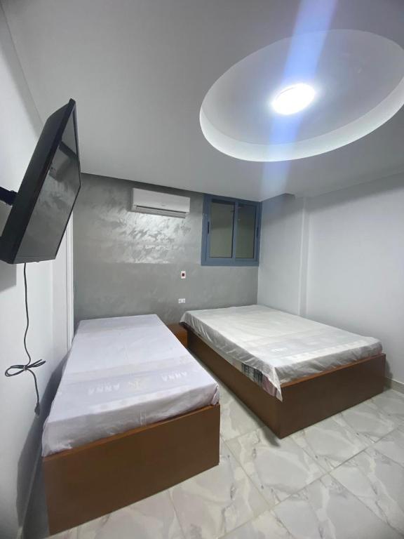 Postel nebo postele na pokoji v ubytování Hotel Del Ceilo