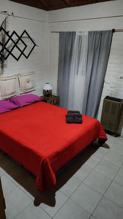 Postel nebo postele na pokoji v ubytování Departamentos Ensueños