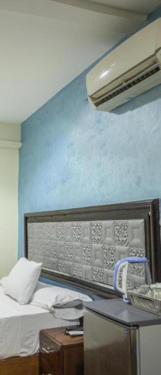 Postel nebo postele na pokoji v ubytování Hotel Del Ceilo