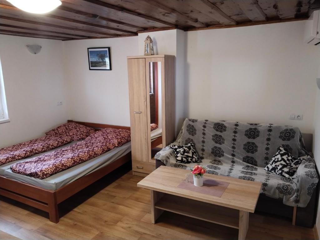 Postel nebo postele na pokoji v ubytování Sklep Jura