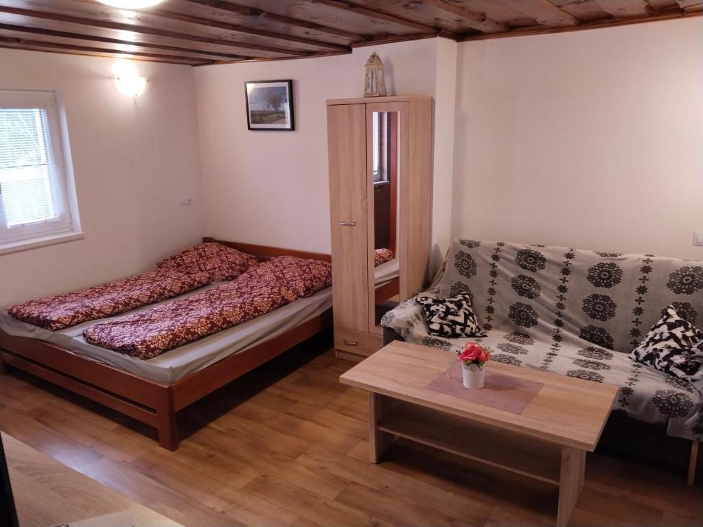 Postel nebo postele na pokoji v ubytování Sklep Jura