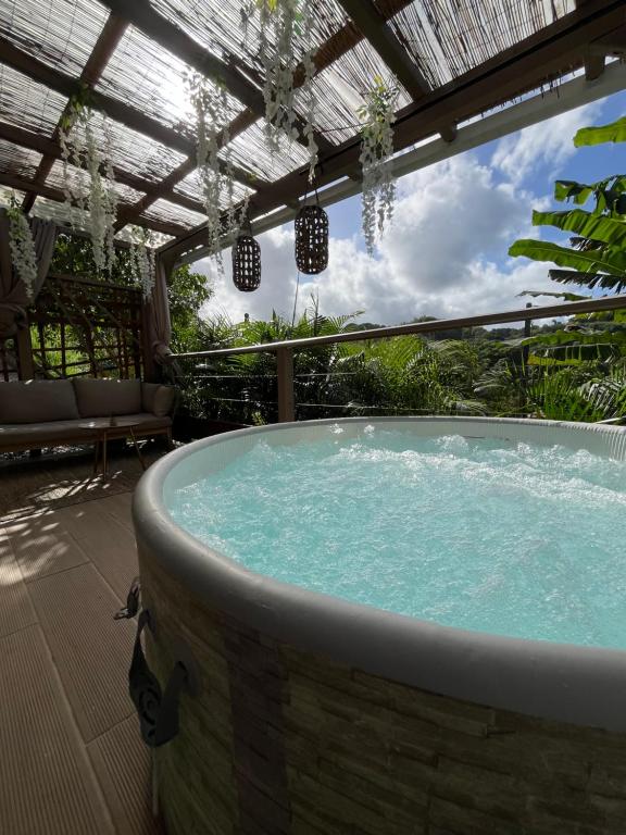 Fotografie z fotogalerie ubytování Cocon des jardins - Bungalow & SPA v destinaci Gros-Morne