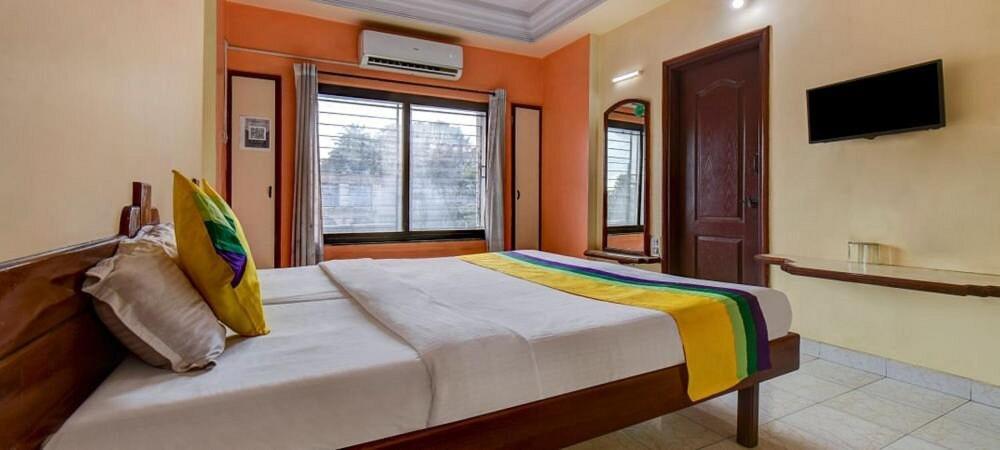Katil atau katil-katil dalam bilik di Hotel Kalalaxmi lodging