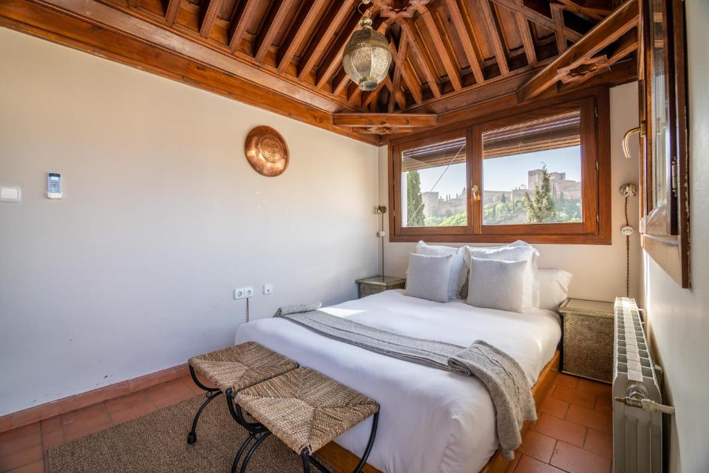 Postel nebo postele na pokoji v ubytování Casa Bombo