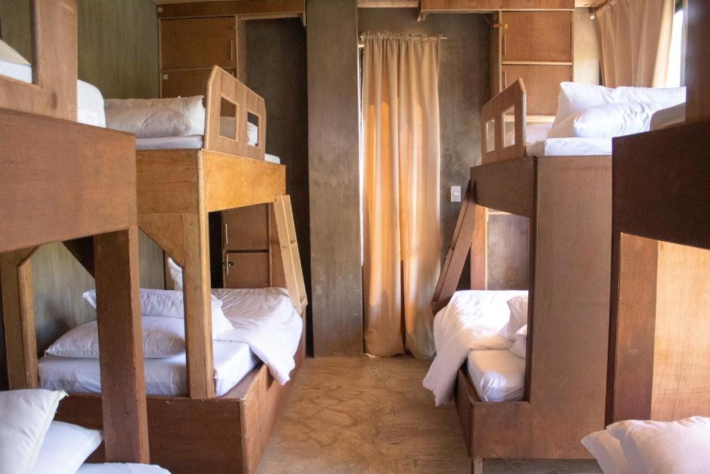 Postel nebo postele na pokoji v ubytování Ohayo Siargao