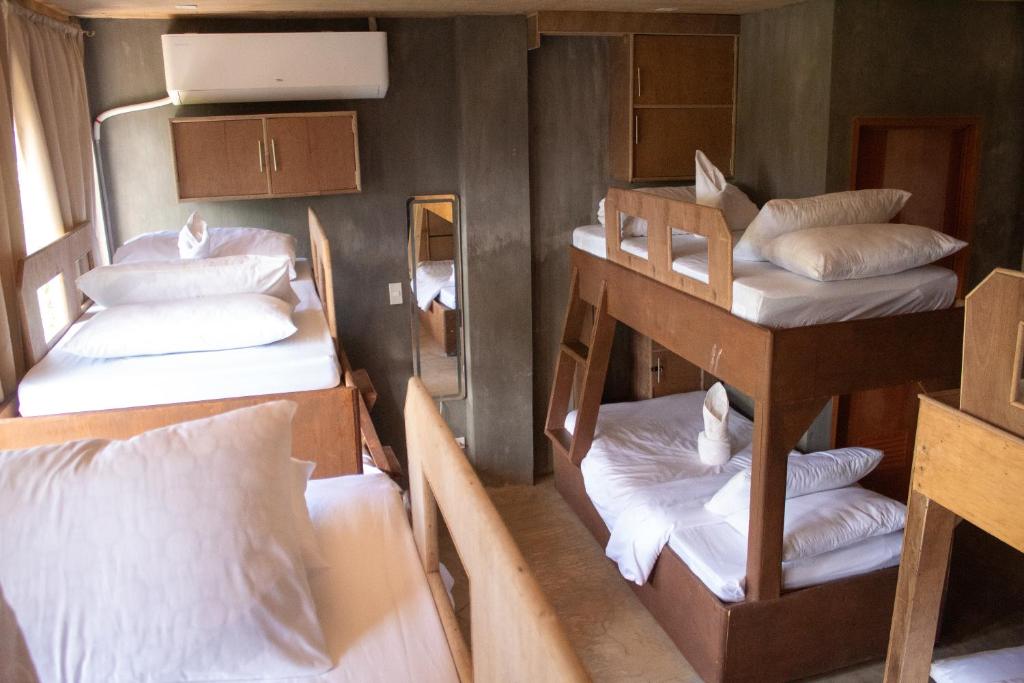 Postel nebo postele na pokoji v ubytování Ohayo Siargao