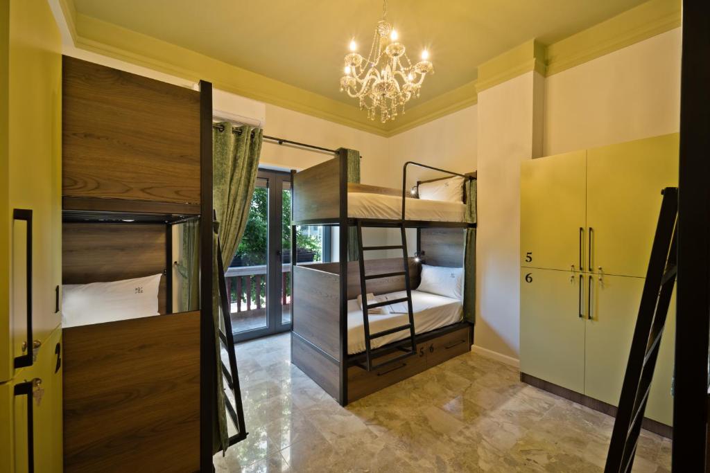 Postel nebo postele na pokoji v ubytování 2115 Boutique Hostel